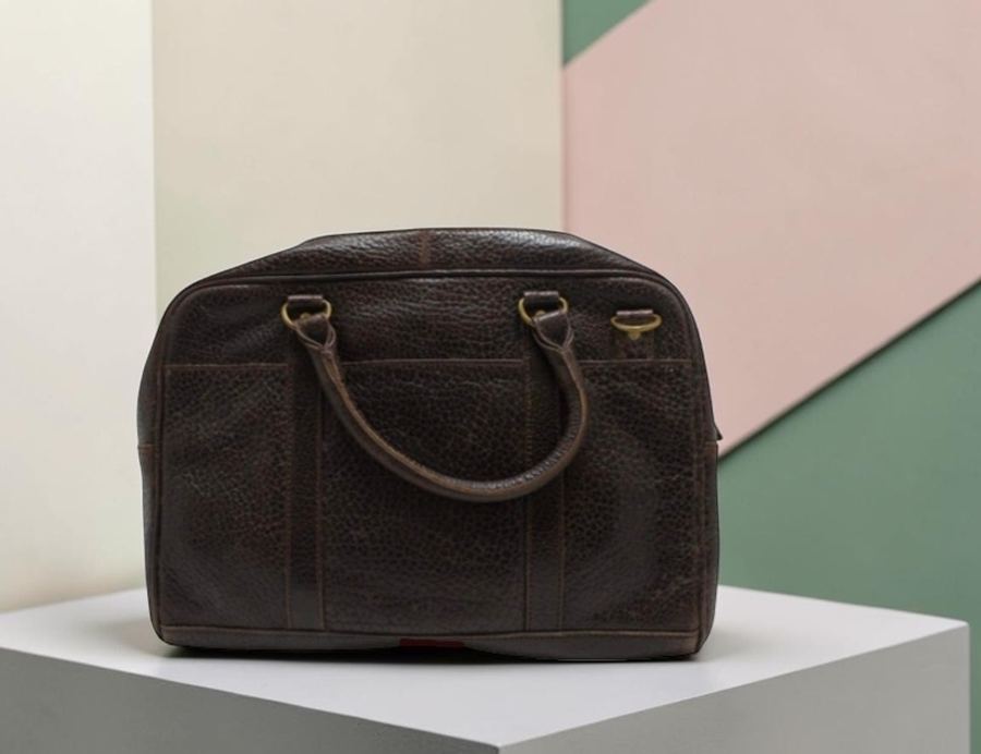 Black leather toiletry bags, two sizes